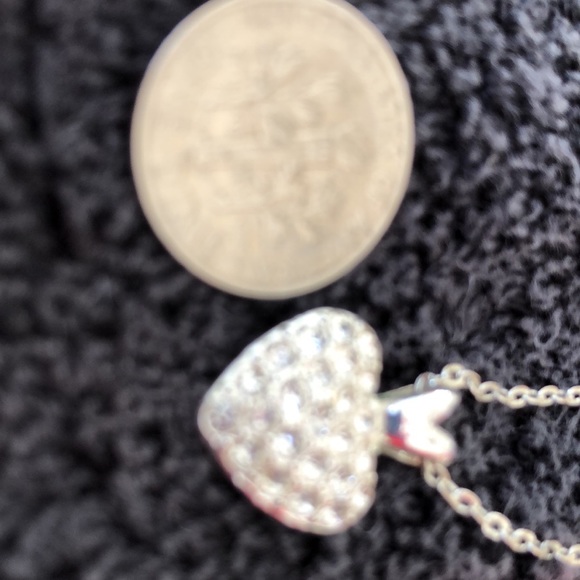 Heart bling dime size w/solid back with slight rub marks on back. Silver color. - Picture 14 of 15